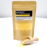 Aromatherapie bad potion 350g in een bruine zak met een houten lepel